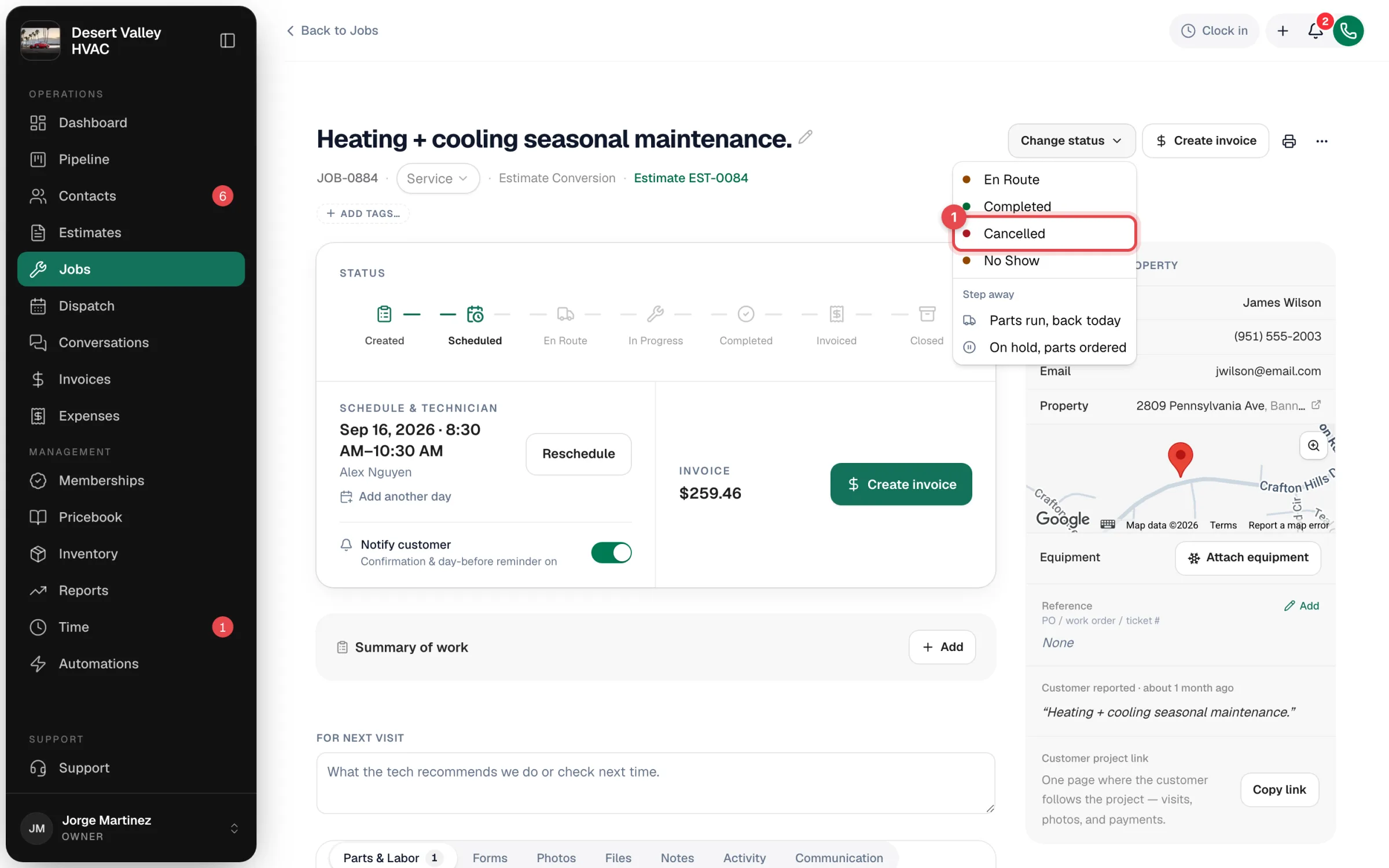 Job page with the Change status menu open and Cancelled highlighted