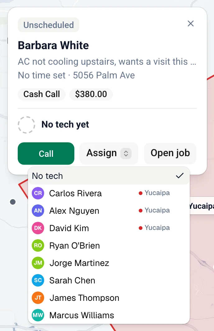 The Assign menu on a job card, with the zone's techs listed first